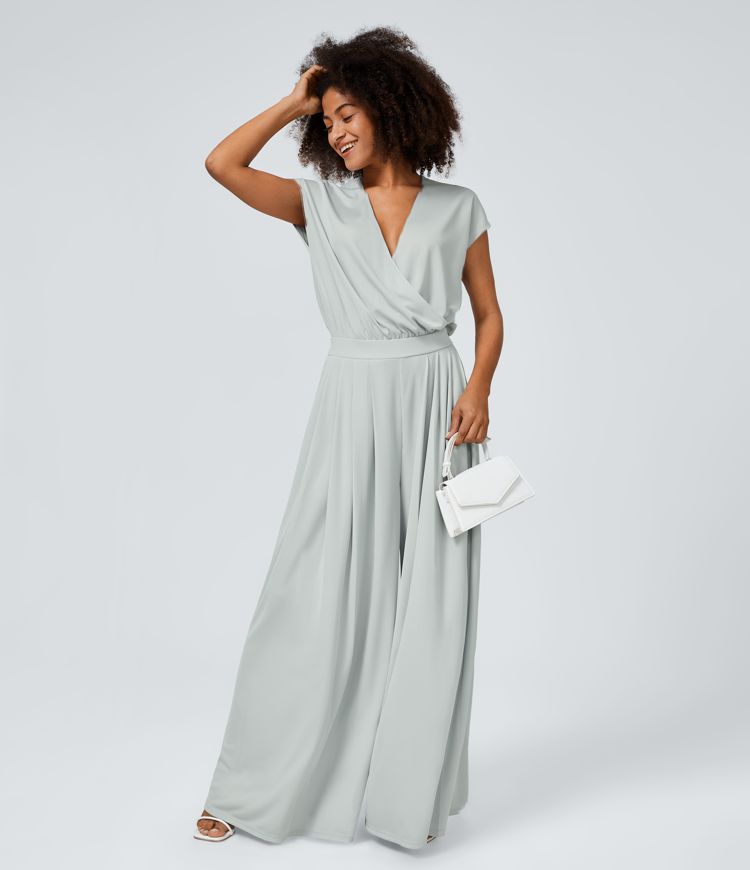 Jumpsuit™ - Tuta con scollatura a V, maniche corte, tasche laterali a pieghe e gamba larga, motivo a onde fluide.
