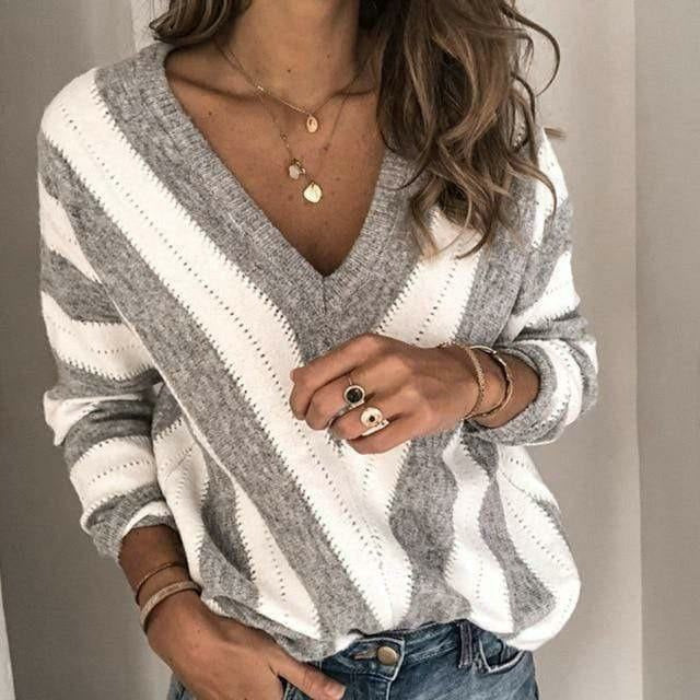 Maglione a righe con collo a V